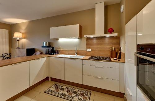 Nevers Apartment | Le Manou, Appartement neuf avec terrasse, parking sous-terrain & ascenseur by PRIMO C0NCIERGERIE