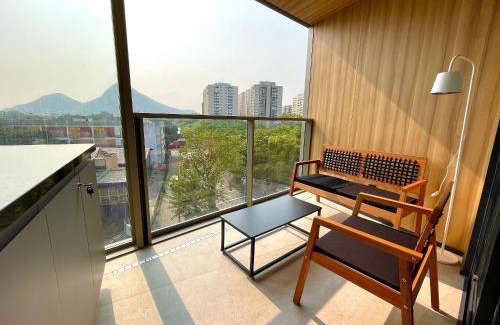 Leblon Apartment | Leblon Studio - View of the Christ, pool and gym.