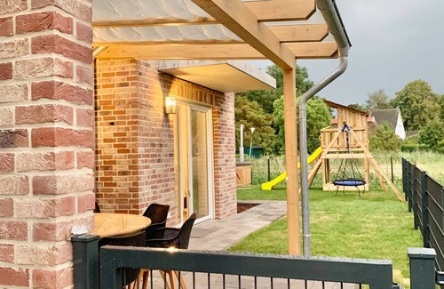 Butjadingen Apartment | Left half of the house Lea for 10 people - dream house on the North Sea with 2 bedrooms