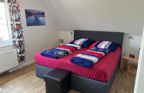 Bassenfleth Apartment | Leuchtturm - maritime Ferienwohnung in Hollern-Twielenfleth
