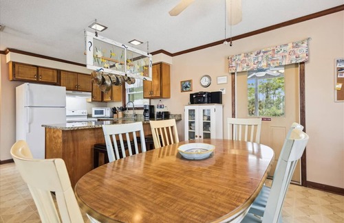 East End House | LISTEN TO THE WIND rustle the pines and the waves crash along the shore.