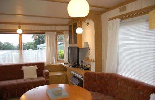 Bryn-crug House | Little Oak Place Caravan A26 at The Woodlands