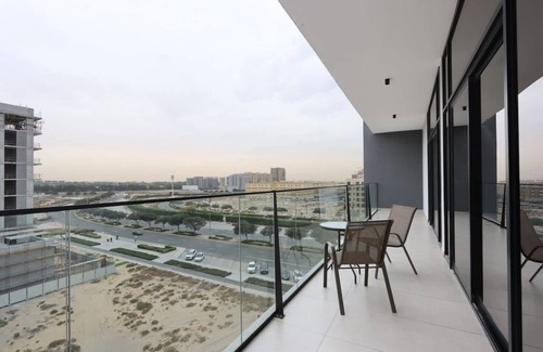 Dubai Production City Apartment | Livbnb-Stylish and Spacious 1B w/Private Balcony