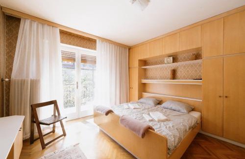 Bezigrad District House | Ljubljana C17 4-Bedroom Private Row House with Garden and Parking