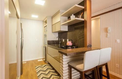 Vila Suica Apartment | Locar-in Gramado - Apto Terrâneo
