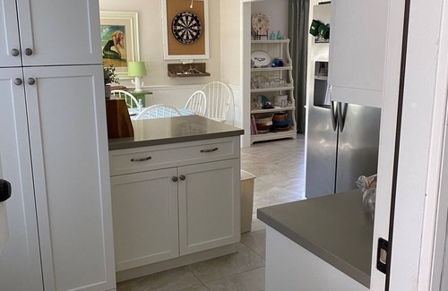 Central Beach Condo | Location Location Location! Steps to the beautiful beach and village!