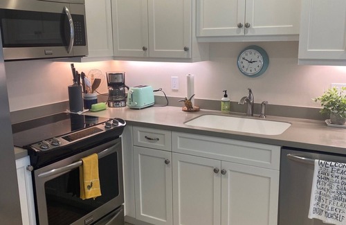 Central Beach Condo | Location Location Location! Steps to the beautiful beach and village!