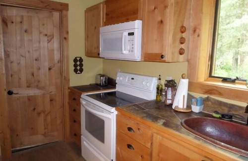 Coram Cabin | Lodge like log home on the Flathead River