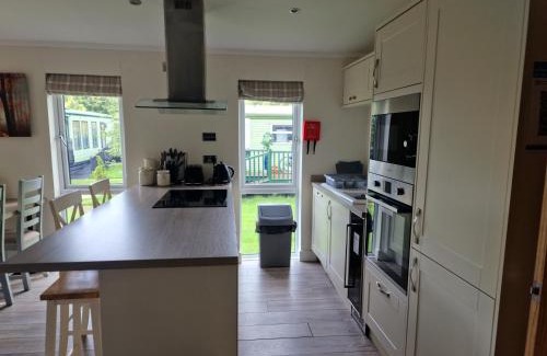 Llanfair Caereinion House | Lodge - Sleeps 6 hot tub & pet friendly
