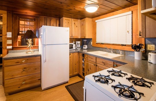 Indian River Cabin | Log Cabin on the Canal of the Indian River between Burt Lake and Mullet Lake!