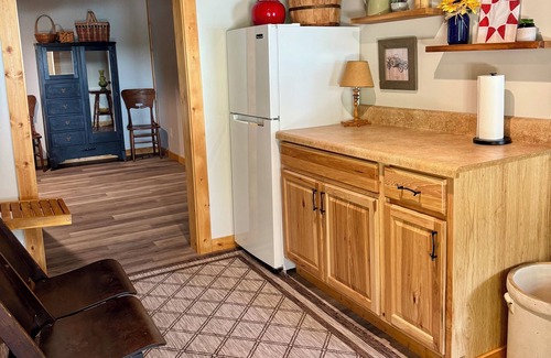 Livingston County Cabin | Log cabin with walkout basement and loft located on Ohio River’s edge.