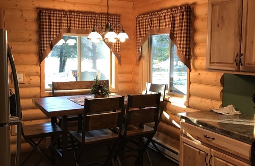 Pine River House | Log home nestled in tall pines near Norway Lake