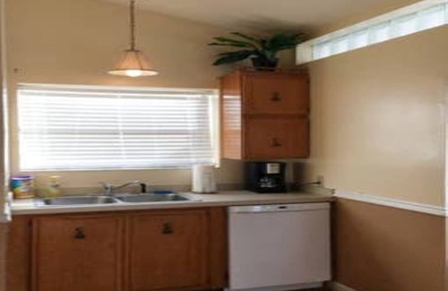 Lockhart House | LONG TERM 6 Month Lease ,the whole Duplex 1/4 of an acre of tropical Bliss Joy!