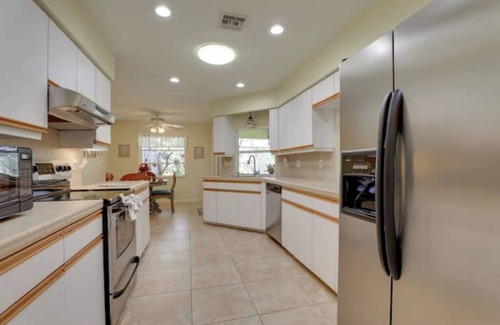 Deep Creek House | Long-term discount! Spacious 3BR Home With Tropical Garden & Koi Pond in Lanai