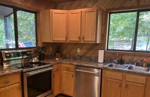 Innsbrook Ski Chalet | Longhorn Lakeside Chalet by Sarah Bernard, Private Dock and Fire Pit