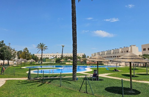 San Jorge House | Look forward to a great sports vacation in this spacious terraced house with communal pool.