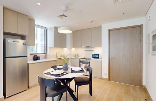 Dubai Apartment | Lotus Creek Beach - Opulent One Bed with Pool View