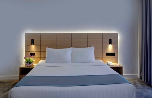 Al Muraqqabat Hotel | Lotus Grand Hotel