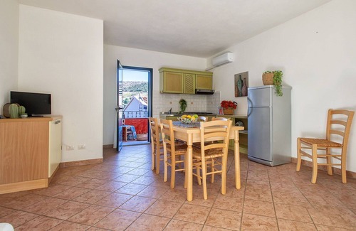Trinita d'Agultu Apartment | Lovely apartment for 6 guests with pool, WIFI, A/C, TV and patio