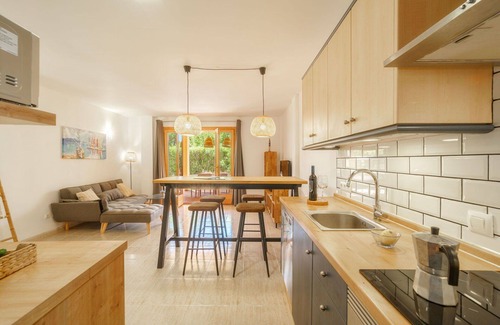 Cala Mandia Apartment | Lovely apartment for 4 people with A/C, pool, WIFI, TV and patio