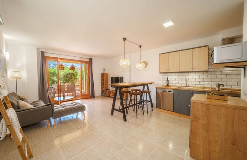 Cala Mandia Apartment | Lovely apartment for 4 people with A/C, pool, WIFI, TV and patio