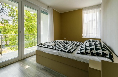 Balatonlelle Apartment | Lovely apartment for 8 people with A/C, internet, pool, TV, balcony and parking