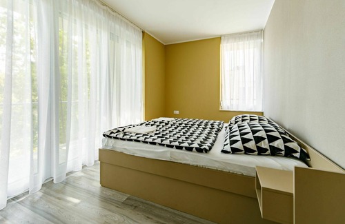 Balatonlelle Apartment | Lovely apartment for 8 people with A/C, internet, pool, TV, balcony and parking