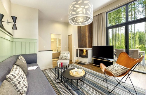 Hattigny House | Lovely apartment in villa for 12 people with pool, hot tub, WIFI, TV and terrace