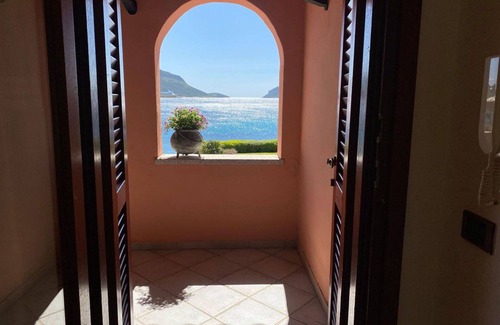 Baia Caddinas Apartment | Lovely apartment for 6 guests with WIFI, pool, A/C, TV, terrace and pets allowed