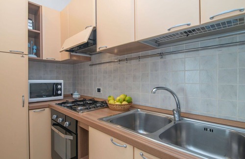 Baia Caddinas Apartment | Lovely apartment for 4 people with pool, A/C, WIFI, TV and terrace
