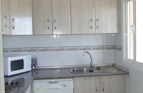 Quesada House | Lovely, Comfortable, Two Bed Town House with Stunning Community Pool. n