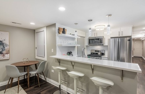 Park West Apartment | Lovely Garden Set up is Perfect for Your Morning Coffee or a Drink After Some Great Blues Music at Kingston Mines by AllSet Turnover