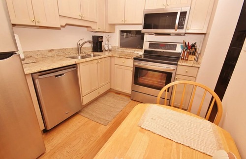 New Smyrna Beach Condo | Lovely Ground Floor Condo with Beautiful View of the Pool and Ocean