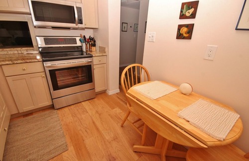 New Smyrna Beach Condo | Lovely Ground Floor Condo with Beautiful View of the Pool and Ocean