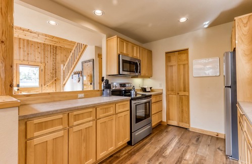 Redmond Ski Chalet | Lovely home with fireplace, deck, grill, shared pool, tennis, and hot tubs