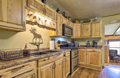 Eagle River Cottage | Lovely Lakefront Cottage w/ Fire Pit & Yard!