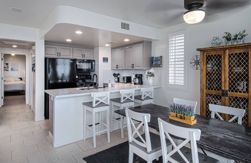Santa Ana Heights Condo | Lovely lower unit with spectacular oversized patio right on the sand!