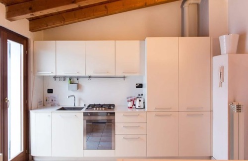 Affori Apartment | Lovely one-bedroom apartment with two balconies in the lively Dergano area.