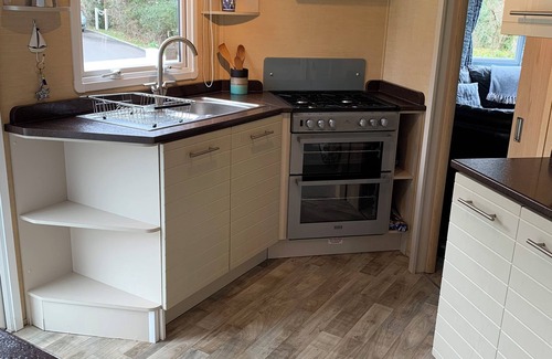 Watchet House | Lovely peaceful caravan site set in wooded grounds-private access to the beach