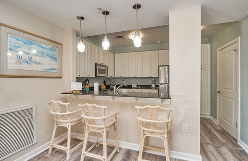 Sandbridge Condo | Lovely Poolside Condo in an Oceanfront Building!