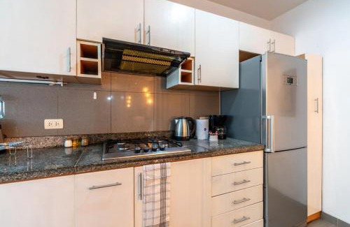 Armendariz Apartment | Lumiere 1BR by Geko