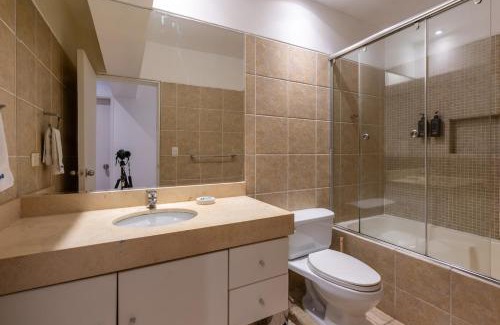 Armendariz Apartment | Lumiere 1BR by Geko