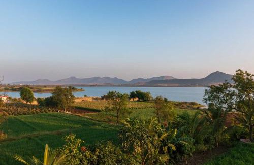 Nashik Villa | Luna Villa by StayVista - Lakeside charm with Terrace, Lush lawn & Modern decor