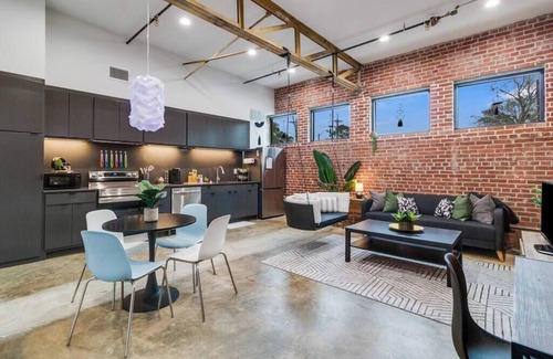 Downtown Apartment | Lux Downtown Flat with Gameroom & Fire Pit