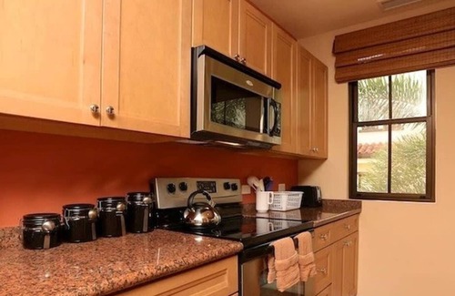 Coco Condo | Luxe! Impressively designed 2nd-floor unit in Coco done in red and orange hues