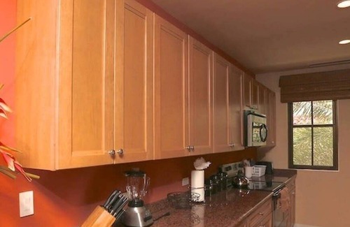 Coco Condo | Luxe! Impressively designed 2nd-floor unit in Coco done in red and orange hues
