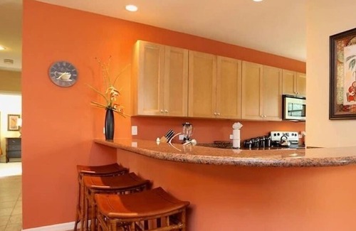 Coco Condo | Luxe! Impressively designed 2nd-floor unit in Coco done in red and orange hues