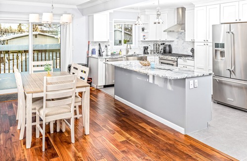 Tudor Area House | Luxe mountain-view escape - 2 condos w/4 fireplaces, deck, hot tub + dogs okay
