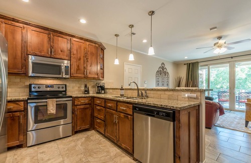 New Braunfels Condo | LUXE RIVERFRONT nCONDOnon the Guadalupe RivernMid-Term Rental Allowed n30+ daysn