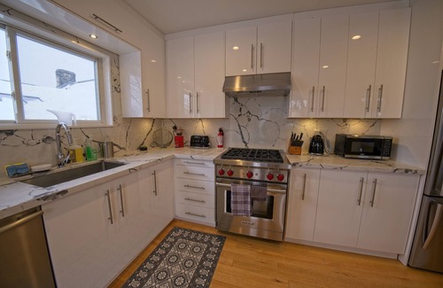 Roncesvalles Village Apartment | Luxurious 2 bed 2 bath, 400 sqft deck, near 400 acre park and lake